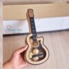 Archivo digital para recortar y armar caja en forma de Guitarra con soporte de chocolates