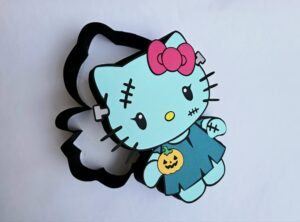 Archivo para recortar y armar caja en forma de kitty halloween, no compartir archivo